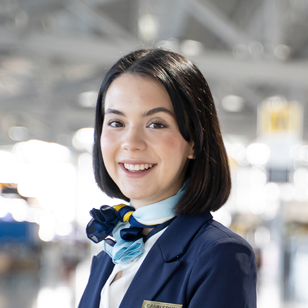 portrait of caucasian flight attendant standing